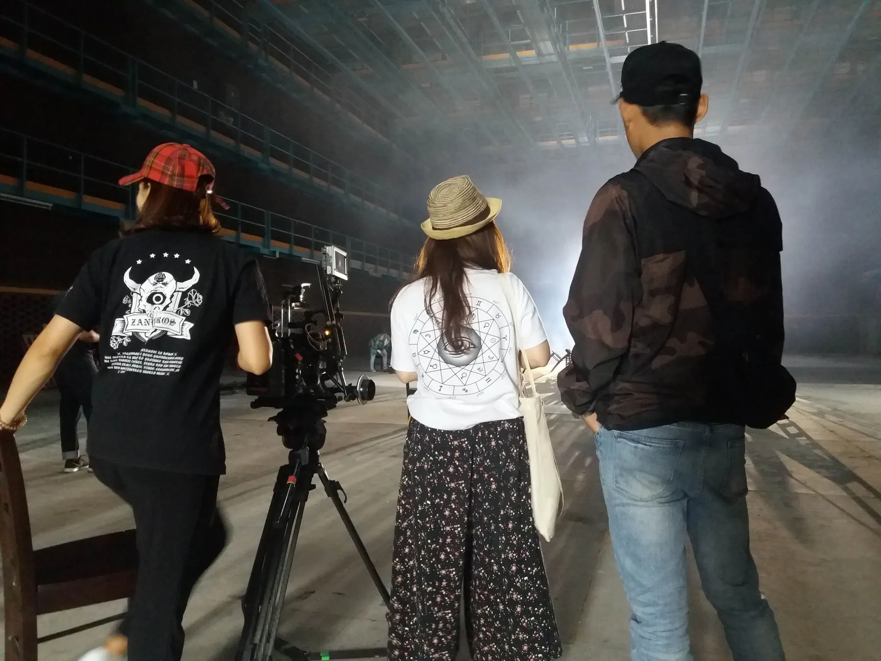 Stage rigging and beams of production light